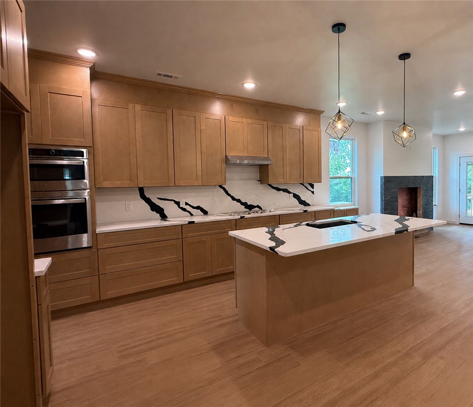 $5,000 SELLER CREDIT! Discover this exceptional new construction home in Rogers, offering the perfect blend of modern luxury, quality craftsmanship, and a prime Northwest Arkansas location. This beautifully designed 4 bed, 2.5 bath residence features quartz countertops, luxury vinyl plank flooring, designer finishes, and an open-concept layout ideal for entertaining and everyday living. The thoughtful floor plan offers spacious living areas, abundant natural light, and a seamless flow tailored to today’s lifestyle. Conveniently located near Heritage High School and just minutes from Downtown Rogers, enjoy easy access to premier shopping, restaurants, entertainment, and daily conveniences, including Whole Foods and Pinnacle Hills Promenade. Buyers will appreciate the opportunity to personalize select finishes and make this home uniquely theirs. Plus, receive a $3,500 lender credit with the preferred lender. Don’t miss this incredible opportunity to own a brand-new Rogers home with style, comfort, and value!