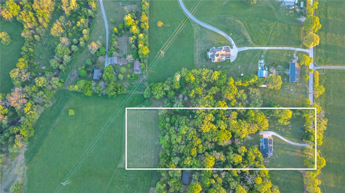 Create the lifestyle you've always imagined—now with your choice of acreage. This custom 4-bedroom, 3-bath home is now offered with 5 beautiful acres and a new price. The level back acreage is a rare opportunity to build the dream shop, create a resort-style pool, add gardens, a pickleball court, or simply enjoy wide-open space for entertaining, recreation, and privacy. Inside, you'll find spacious living areas, quality finishes, and a layout designed for everyday living and memorable gatherings. Located just minutes from downtown Bentonville, Walmart Home Office, Crystal Bridges, and everything Northwest Arkansas has to offer, this property delivers the perfect balance of convenience and country living. Also available with 3 acres (see MLS#1343563).