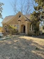 UNIQUE HISTORICAL HOME:  This home is designed for a large family or entertaining.  Featuring 5bed / 4bath. There is a sunroom, ideal for enjoying your morning coffee or relaxing with a good book. The upper level includes 2 bedrooms and 1 bathroom, offering a canvas for your creative updates. Step out onto the large deck from the upstairs back bedroom. There is an inground pool that awaits restoration to regain its former charm. The backyard features a Koi pond just off the large deck, while the generous lot provides ample space for gardening, play, or simply enjoying the outdoors. With limitless potential and an array of attractive features, this home is being sold in its current condition. Don't miss an opportunity to own a piece of Dardanelle's history.
