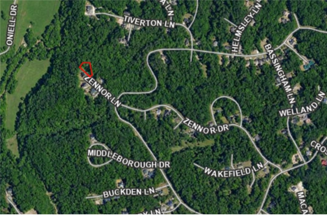 Exceptional lot for sale overlooking a creek ready to develop into the home of your dreams.