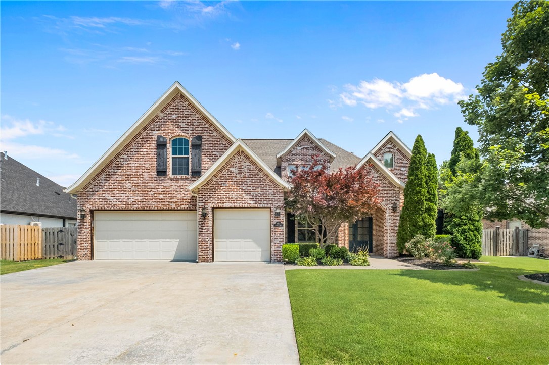 Updated 4 bedroom, 3.5 bathroom home in Warren Glen, one of Rogers most desirable neighborhoods, just minutes from the Greenway Trail, shopping, dining, and I-49. Designed for both everyday living and entertaining, the main level features a private primary suite, dedicated office, oversized laundry, built-in cubbies, and a spacious living room with a gas fireplace that opens to the eat-in kitchen with bar seating and a butler's pantry. A formal dining room with coffered ceilings adds timeless character. Upstairs offers 3 bedrooms, 2 full baths, and 2 bonus rooms perfect for a media room, playroom, home gym, or additional office. Enjoy the private beautifully landscaped backyard, saltwater in-ground pool with diving board, built-in grilling area, and plenty of space to entertain. Additional highlights include a 3-car garage and neighborhood amenities including a community pool, playground, basketball and common areas.