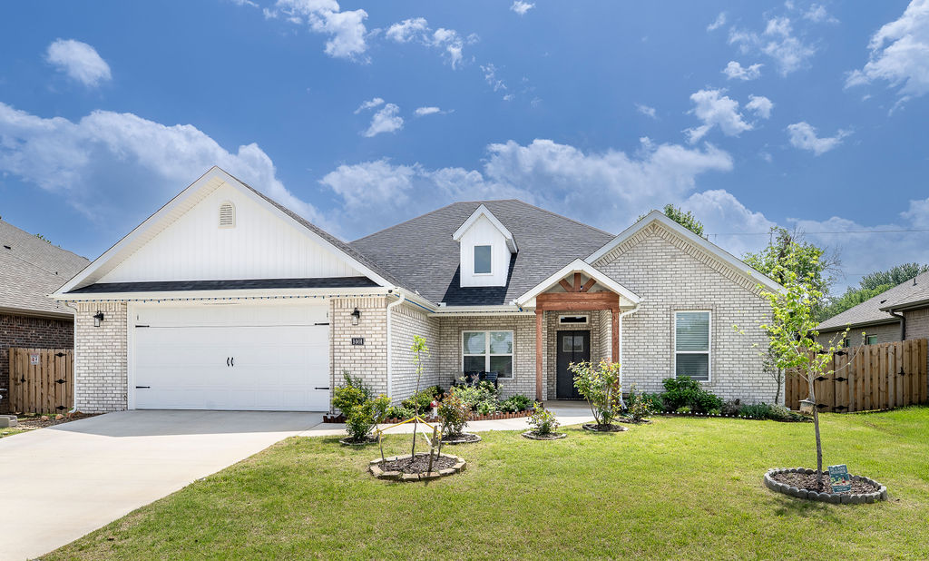 Nearly-new all-brick home built in 2024. This ranch style home features 4 bedrooms, 2.5 bathrooms, and a bonus area for a formal dining room or work/play space.  The kitchen is open and modern with upgraded appliances, an oversize sink, a large granite island and a pantry for storage. The primary suite feels like a retreat, featuring a tiled walk-in shower and separate tub.  The fully fenced backyard is well manicured and flat.  All the extra upgrades give this home the custom touch you've been looking for.