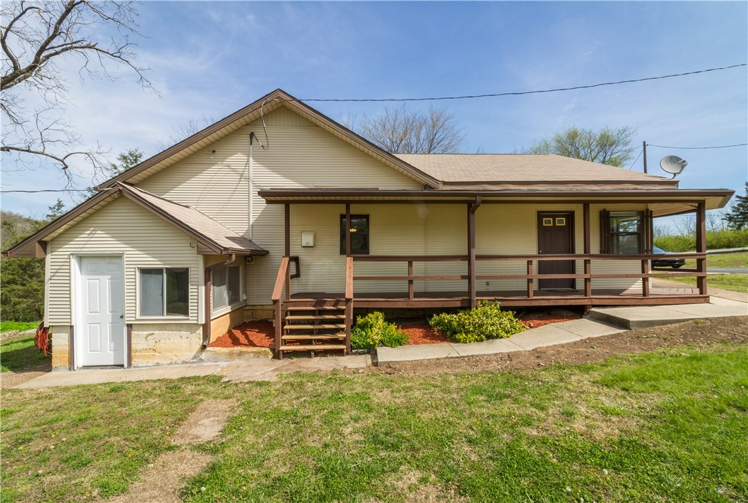 Picturesque 80 ac farm with remodeled farm house. This property has many things to offer including, 4 ponds, new cross fencing, 30x50 shop building, garden spot, multiple wells, gas and water hook ups for RV's, new roof, new carpet, paint, hardwood floors and many more features.