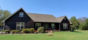 Looking for a 4 bedroom 3 full bath home with some elbow room yet close to town? If so, you have got to see this country charmer! This lovely home sits on 1.4 acres and features hardwood flooring, tall ceilings, and a spacious split floor plan that includes a breakfast area, formal dining room, an office/game room, plus a finished bonus room over the garage. The covered back porch and deck are perfect for entertaining or simply relaxing at the end of the day. The 12x20 storage building is great space for lawn equipment and additional storage. Don't miss seeing this one.