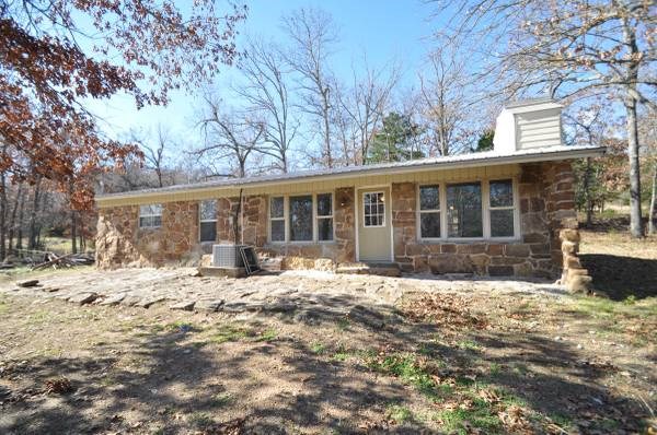 Totally remodeled 3 bedroom 1 bath 1300 sq ft stone home sitting on 80 beautiful rolling acres with a natural spring and pond on property. Hardwood floors throughout house. Stunning rock fireplace in living room. Granite countertops in kitchen. Enjoy all the wildlife. Deer and turkeys galore. No pets. No smoking. 1 year lease minimum