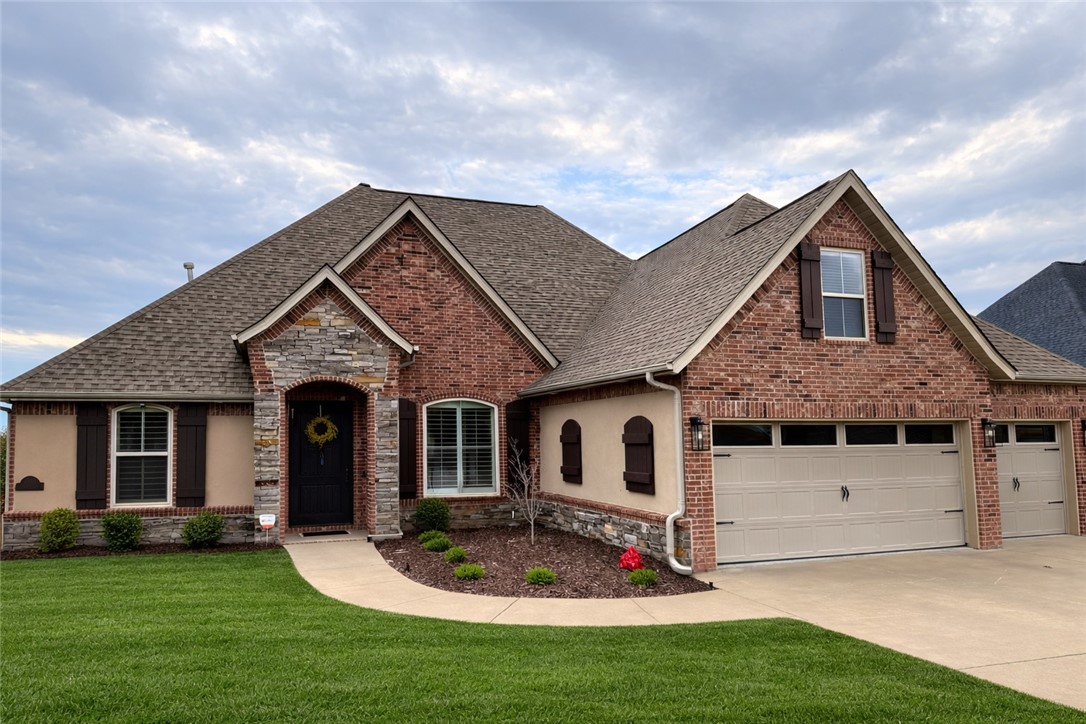 Well appointed & updated home in highly sought after Warren Glen Subdivision. Minutes from I-49, schools, shopping and biking trail. New wood flooring & tile throughout in 2021- including new carpet in 2025 on second level. All new quartz countertops, updated lighting, & new steam shower in primary bath in 2021.New roof in 2019. Media room with wet bar area for entertaining. In ground storm shelter in garage. Backyard features screened patio, pool bath, & vinyl pool with new liner in 2025. Must see!