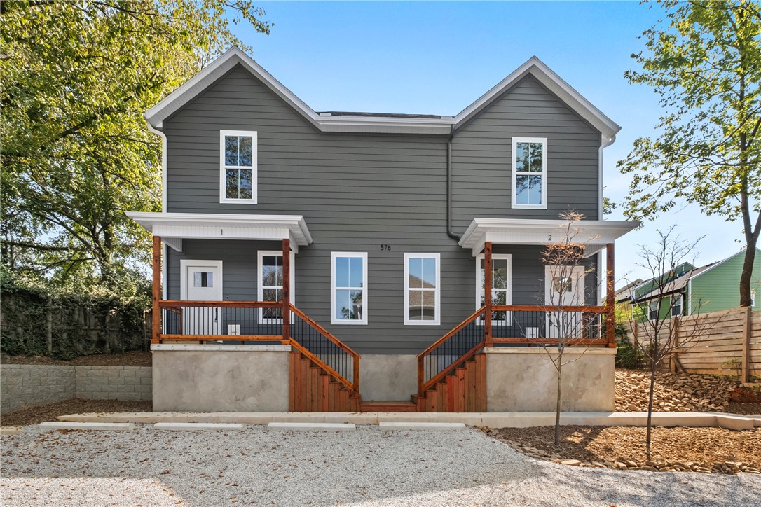 Discover modern living in this brand new townhouse located just off MLK in Fayetteville-perfectly positioned for convenience and accessibility. Just 4 minutes to the University of Arkansas! This home offers a smart layout with the living room, kitchen, dining area, half bath, and in-unit laundry all on the main level. Upstairs, two bedrooms each feature their own private full bathrooms, providing comfort and privacy.