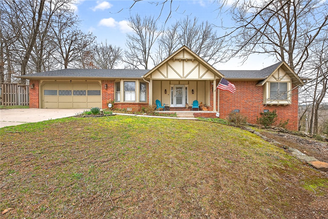 Beautifully renovated home featuring a bright, open layout and a calming, modern color palette complemented by stylish light fixtures throughout. The main living area flows seamlessly between the kitchen, breakfast nook, dining, and living spaces, creating an inviting environment for everyday living and entertaining.

Just off the main space, a sunroom offers additional natural light and a perfect spot to relax. From there, step out onto a spacious wrap-around deck (approximately 450 sq ft, with an 18' x 18' main area), ideal for hosting or enjoying the outdoors.

Additional features include a 10' x 7' shop room off the garage and a finished, climate-controlled storage area beneath the home (approximately 8' x 20').

The front yard provides ample space for gatherings, play, or outdoor activities, making this home as functional as it is welcoming.