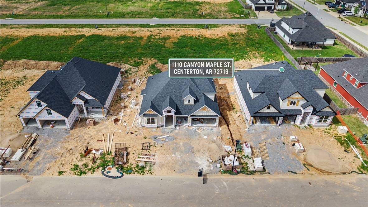 This home is mid construction and expected to be completed on July 1, 2026. LOT 147. The Sullivan Plan offers 4 bedroom, 3.5 baths including two bedrooms and a bonus room upstairs, while the main level features one secondary bedroom and a private primary suite with direct access to the utility room. The open-concept living area flows seamlessly into a thoughtfully designed kitchen, complete with a breakfast nook, large island, and an expansive walk-in pantry making it a standout space for cooking and gathering. Highlights include a covered back patio with a convenient storage room and a 3-car garage. Walkable to Centerton Gamble and Bentonville West High School and just 10 minutes to Downtown Bentonville. Fence blinds and gutters are included. Introductory pricing for a very limited time. Maple Estates offers a community pool, and clubhouse for your enjoyment.