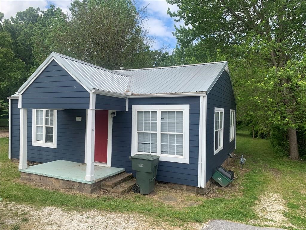 Cozy home is move in ready and within less than a mile to the U of A campus. Features include real hardwood flooring, two spacious bedrooms, one full updated bath, large lot size, big backyard and a covered front patio. Includes Washer and dryer.