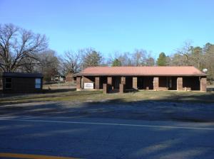 Possible Owner Finance! Very near the Carter Cove and Quarry Cove access to Lake Nimrod. This large brick W/metal roof building, bait shop and cabin located on approx. 1 ac was once a restaurant with adjacent bait shop, rental cabin and RV parking. It could easily be converted to a home with mother in law quarters, family weekend retreat, recreational rental or other recreational oriented business
