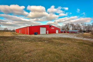 One of the best equine farms around!! 17.75 ac m/l of prime pasture with pipe fencing and everything you will need to make a profitable horse farm. 16,000 sq ft of indoor riding arena, 15 horse stalls with rubber flooring & auto watering, tack room, two wash bays, vet stall, 5 garage doors & a large overhead viewing area. Large office with full bath and partial kitchen. Five field auto waterers, eight horse sheds, horse hot walker, well water and a large hay barn. See also MLS 140385 for the commercial bldg and price. All this and near the Buffalo River, numerous lakes & Branson, MO.