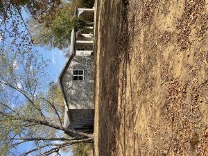 COMPLETELY REMODELED NEW FLOORING, NEW PAINT, NEW BATHROOMS, NEW KITCHEN CABINETS, NEW GRANITE COUNTER TOPS, NEW AC UNIT, NEW DECK, NEW TANKLESS HOT WATER HEATER this 3 bedroom 2 bathroom home on a 1.24 acres has spacious bedrooms walk in closets and utility room. Home also has new appliances down private driveway. Not available for showings until October 28, 2024