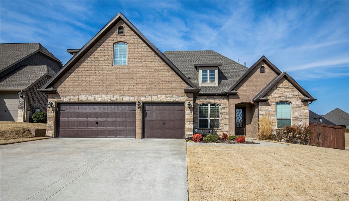 Live in highly sought after Woods Creek & be minutes from Downtown Bentonville, Crystal Bridges, Walmart Home Office, 8th St Market, biking trails, & I-49. This impressive home features 4 BRs + 3.5 baths + office + FDR + bonus room. This show-stopper kitchen boasts 5 burner gas cooktop, granite, large pantry, island w/ storage, dry bar w/ built-ins, & Italian tile flooring. Upstairs are 3BRs all with large W/I closets. 2BRs share a jack & jill bath (each have own sink & toilet but share a shower). Bonus room w/ wet bar & has access to full bath. Unwind outback under the covered patio or put your feet up around the fire pit. Oversized 3 car garage & walking distance to pool, playground, & ponds. You will fall in love with this one!
