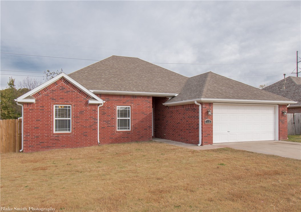 Check out this 3 bedroom, 2 bath house with new hardwood flooring throughout the entire house. The master suite features whirlpool tub with his & hers closets. Open floor plan with gas log fireplace in living room. Covered patio, privacy fence. Call or email today for more information or to book a showing.