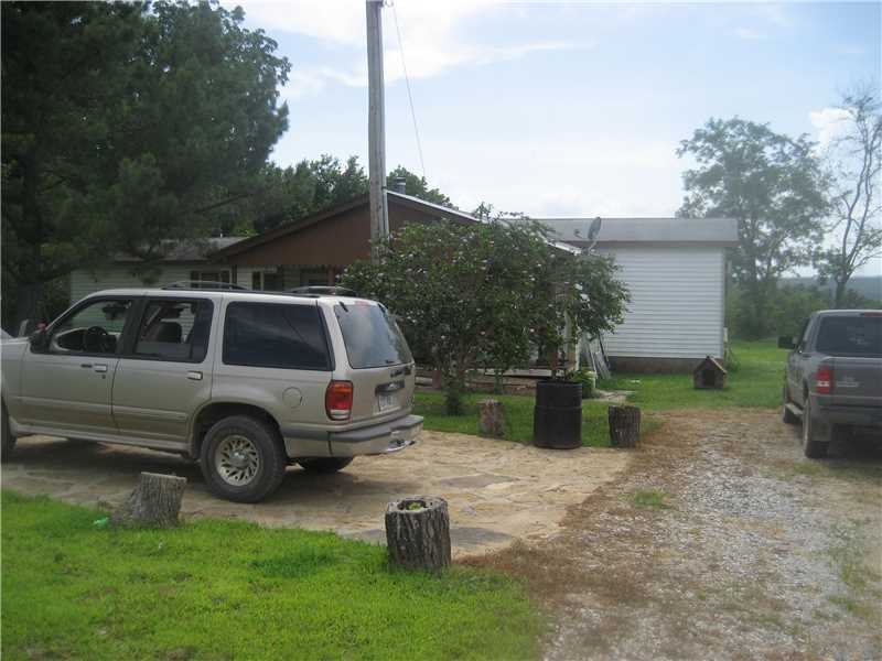 Great starter home in the country with a pond, 5 acres & view. Agent owned
