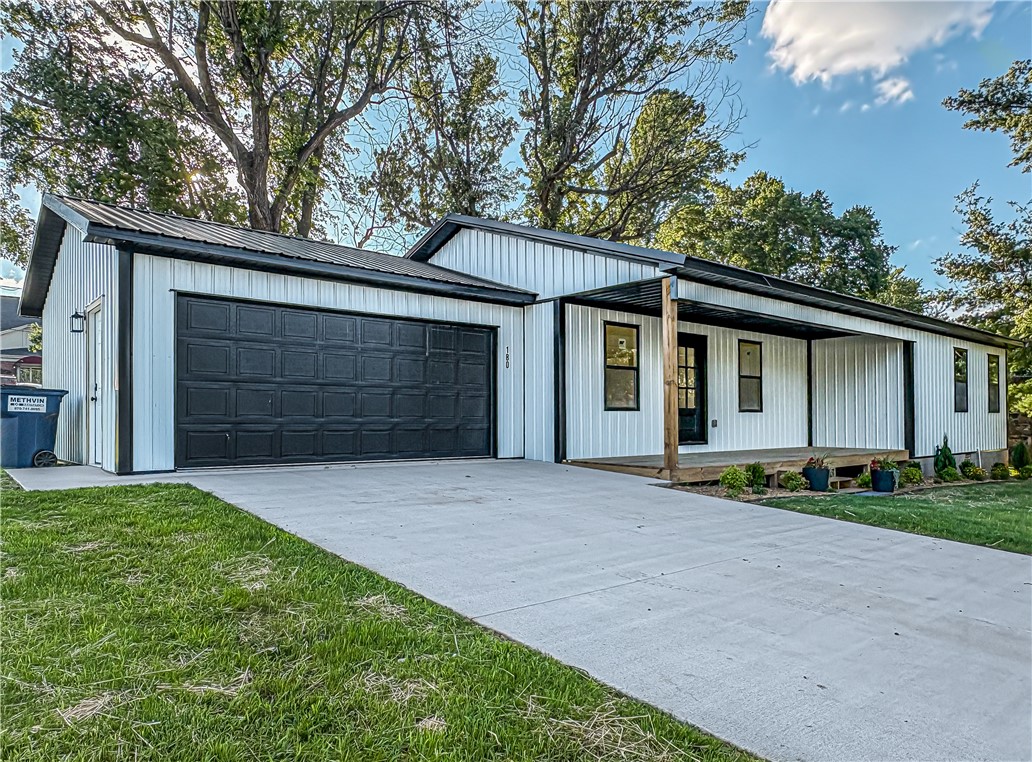 New Construction home just outside of City limits. This stunning and spacious 3 bedroom, 2 bath, 2 car garage, home sits just over a mile from Harrison city limits, has a large, partially fenced yard and is waiting for new owners. Features include open floor plan with vaulted ceiling in the great room, new appliances, large bedrooms with ample walk in primary closet, elegant walk in shower with double shower heads, solid surface counter tops, LVP flooring throughout, covered front porch and open back deck and is ready for you to take a look!