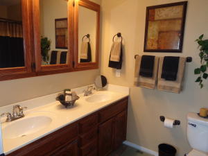 FABULOUS CONTEMPORARY IN 'THE MEADOWS' SUBDIVISION!! Prepare for love at first look! The entryway is inviting & sets the tone for therest of the home. It's comfortable, spotless living on almost an acre in the Ludwig area! Open, split floor plan with cathedral ceilings & a charmingmaster suite. You'll feel right at home in the kitchen with Silver Mist appliances & stained red oak cabinets! The master suite has a Jacuzzi tub,tiled shower & dual vanity sinks. The back of the home offers a covered patio and a manicured yard!