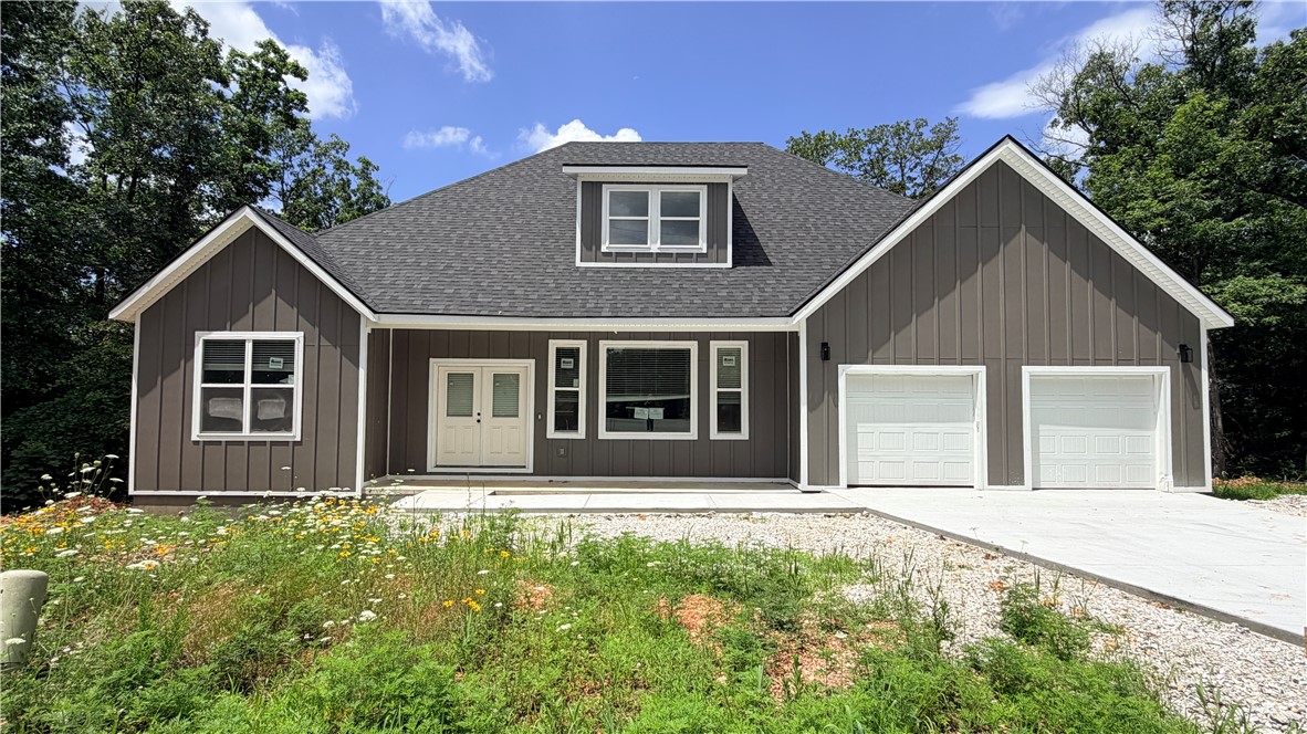 **Seller is offering $5000 toward Buyer closing costs and/or concessions** Brand-new construction offering 2,326 square feet with a desirable split-bedroom floor plan, 3 bedrooms, and 2 bathrooms. The thoughtfully designed kitchen features elegant quartz countertops, a marble tile backsplash, stainless steel appliances including a gas/propane cooktop, electric oven, and dishwasher, plus ample workspace for cooking and entertaining.  The spacious living room is highlighted by a cozy gas/propane fireplace with a stylish ceramic tile surround. Throughout the home, you'll find recessed lighting, ceiling fans, and 2-inch faux wood blinds, creating a bright and comfortable living environment.  The private primary suite serves as a relaxing retreat with a spa-inspired bath featuring a soaking tub, separate tiled shower, dual vanities, and quartz countertops. Generous walk-in closets provide abundant storage space.

Taxes are currently based on land value only.