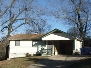2 BR home on large lot. CH/A, carport. Large trees. Owner states CH& A unit replaced in 2013. New hot water heater 2014. Economical housing or rent it out! Age and acreage are estimates. All numbers are approximate.