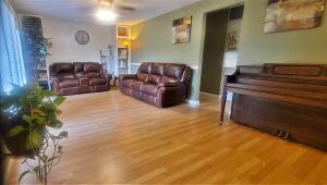 This beautiful 4 bed 2 bath home sits peacefully down a quite dead-end road. It includes a massive 3 car garage and a 49'x25' deck that wraps around a large 32' long pool. The pool has a 6' deep end and is well maintained with a newer pump and auto chlorinator.  The property has a chain link fence, a raised garden, and a 10x20 shed.  Don't miss seeing this home!