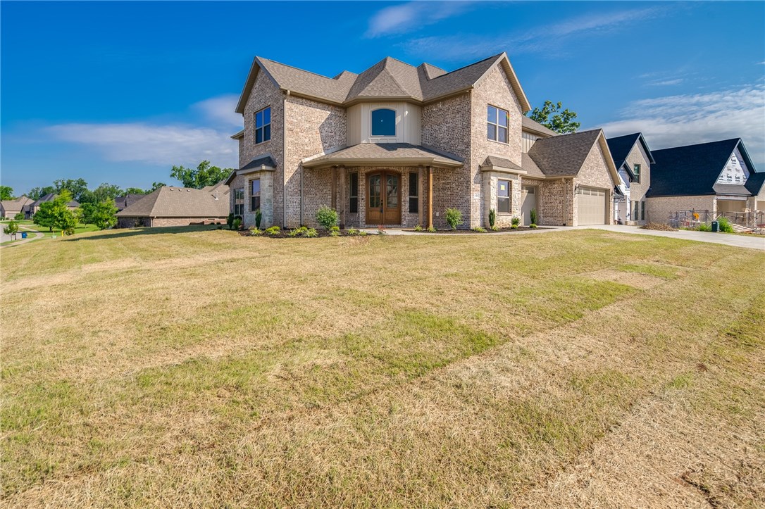 Gorgeous Tall Oaks Construction sitting on large corner lot in Woods Creek at Amber Ridge!  Best-Selling floorplan featuring grand entry leading into this amazing 5BR/3.5BA home. Gourmet kitchen that is the heart of the home with all the bells and whistles (gas cook-top, double ovens, large granite island)! Master Suite with huge master closet. Home also includes office, formal dining and upstairs huge bonus room with wet bar. Great entertaining space on back patio!!  A must see home!  Come and make it yours!