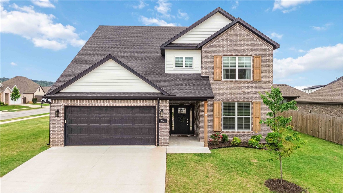 Welcome home to this beautiful Craftsman-style home in the popular Riverwalk subdivision in Southeast Fayetteville! With 4 bedrooms, 3 baths, and a large bonus room upstairs, this home offers plenty of space to relax, work, and entertain. The main level features a private primary suite along with a fourth bedroom or home office. You'll love the warm wood floors, oversized island, gas cooktop, farmhouse sink, quartz countertops, stainless steel appliances, mudroom with built-in desk, and butler's pantry. Upstairs includes two additional bedrooms, a full bath, and a spacious bonus room. The home sits on a level oversized corner lot. Nestled in a peaceful community filled with families and outdoor amenities, Riverwalk offers walking trails, White River access, scenic views, and a neighborhood pool to enjoy during the lazy days of summer!