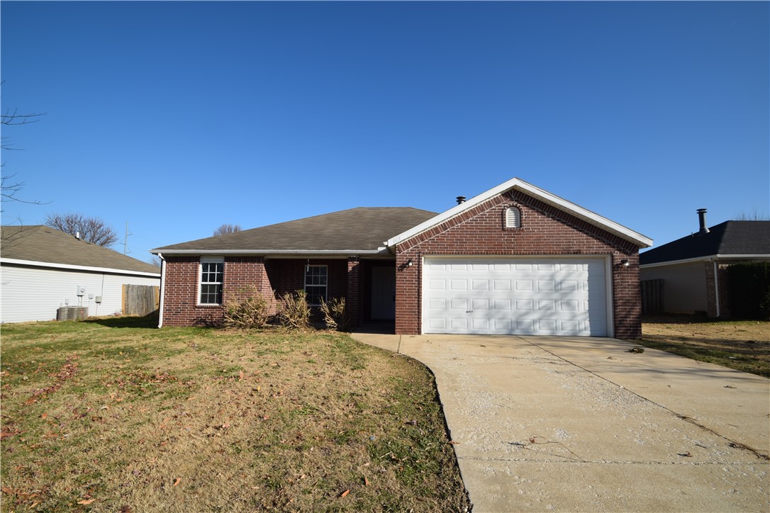 Come see this updated Bentonville Home! This charming 3-bedroom, 2-bathroom home is perfectly situated in a great Bentonville neighborhood. The interior boasts an open layout and a cozy wood burning fireplace.  Home has a galley kitchen with black appliances.  The large primary suite is complete with a spacious walk-in closet. Outside, the property offers a 2-car garage and a fully privacy-fenced backyard, ideal for outdoor enjoyment. This is a smoke-free residence; pets are negotiable and subject to owner approval.