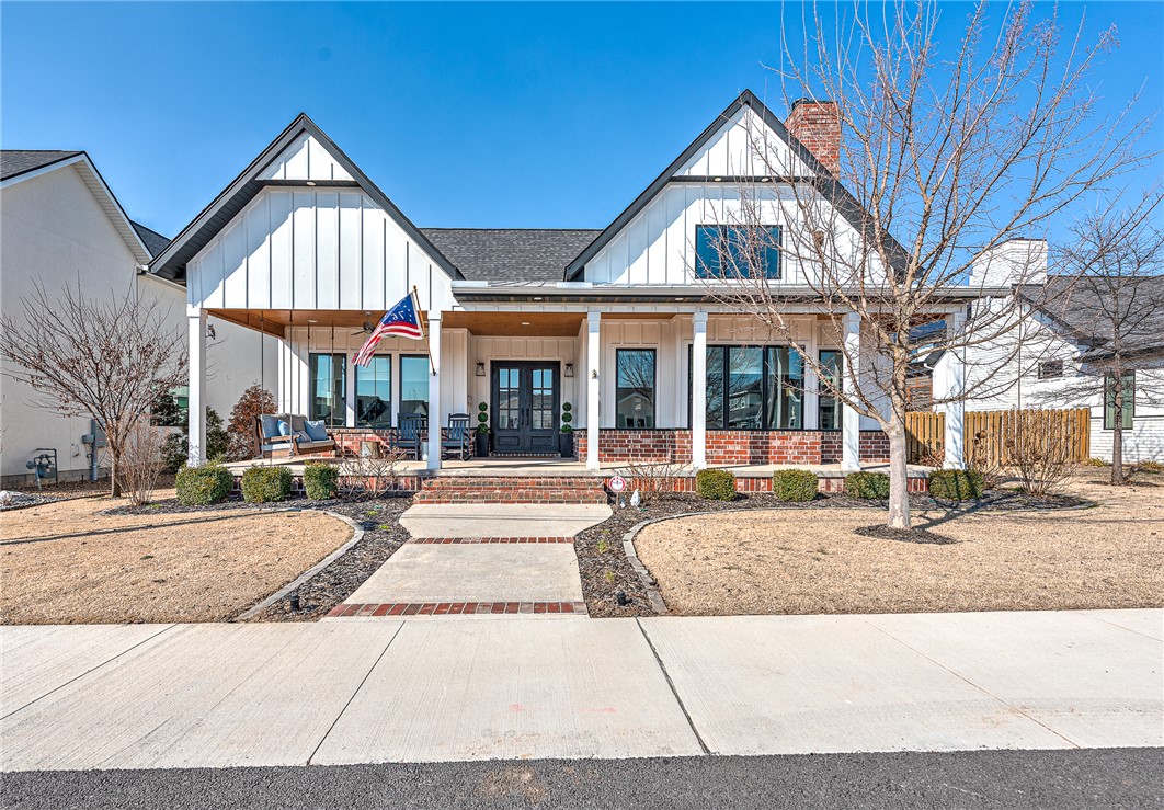 Welcome to a truly one-of-a-kind Downtown Bentonville property nestled on a charming street with through lot positioning. This home invites you in with a welcoming covered front porch. Inside, you’ll find stunning exposed brick and richly stained wood accents that create warmth and character throughout. The chef’s kitchen features a professional gas range, apron-front sink, butler’s pantry, & coffee bar. A dedicated home office with a cozy gas fireplace provides the perfect work-from-home retreat, while the elegant living room is anchored by a striking exposed brick, wood-burning fireplace. Exceptional indoor-outdoor living with a sun room featuring a dramatic glass garage door that fully opens to the patio, creating a seamless flow. Enjoy a full outdoor kitchen, gas grill, pizza oven, wood-burning & fire pit. Rinse off in the outdoor shower after a long ride & relax in your own private sauna for a true spa-like experience.  Add'l highlights include: a 3-car garage, storm shelter, flex hobby room, & a media room.