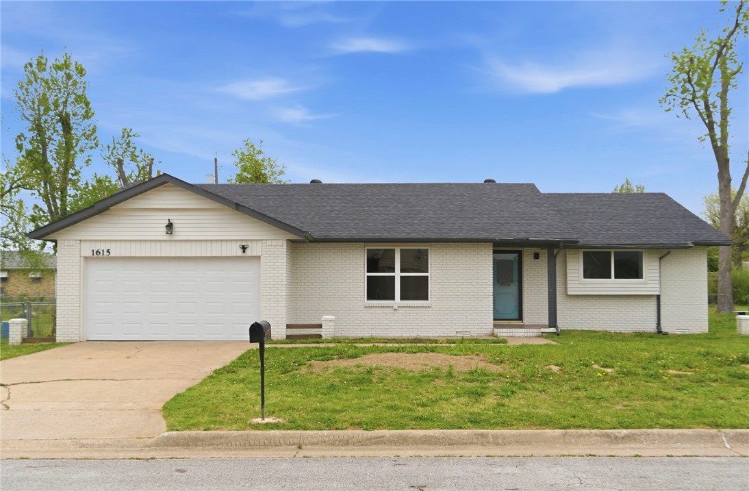 Located in an established Rogers neighborhood just minutes from Hwy 71, downtown, shopping, and dining, this updated 3-bed, 2-bath home has all the big-ticket items already covered. A brand-new roof and all-new double-pane vinyl windows deliver lasting peace of mind, while the refreshed interior features new tile flooring in the kitchen and newer stainless steel appliances. Bedrooms offer generously sized walk-in closets, and the primary bedroom includes two closets plus a private en-suite bath with a standup shower. A spacious sunroom with new tile flooring, ceiling fan, and fully enclosed windows and doors overlooks a large, tree-lined backyard — perfect for relaxing or entertaining. A storage shed and three-sided chain-link fence round out the outdoor space. Walking distance to the Rogers Public Library and just a quarter mile from Hwy 71 — you're minutes from restaurants, shopping, and everything Rogers has to offer. Updated, move-in ready, and priced to move!