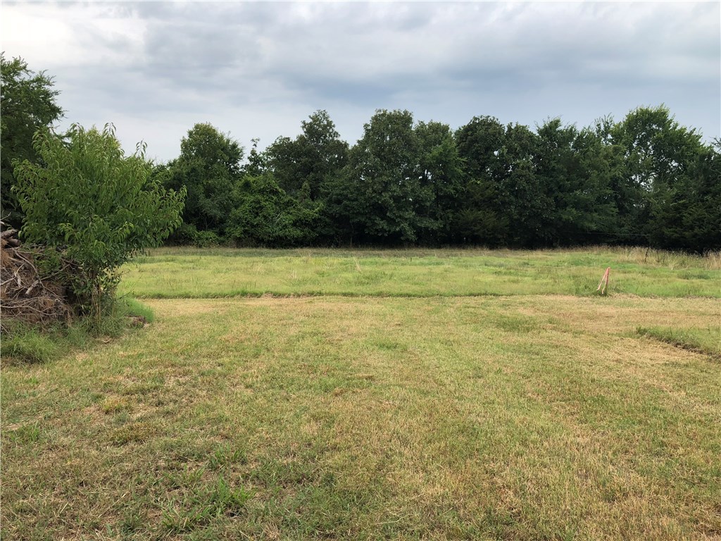 Great location to build a house or put a mobile. Water and septic already located on acreage. Agent owned