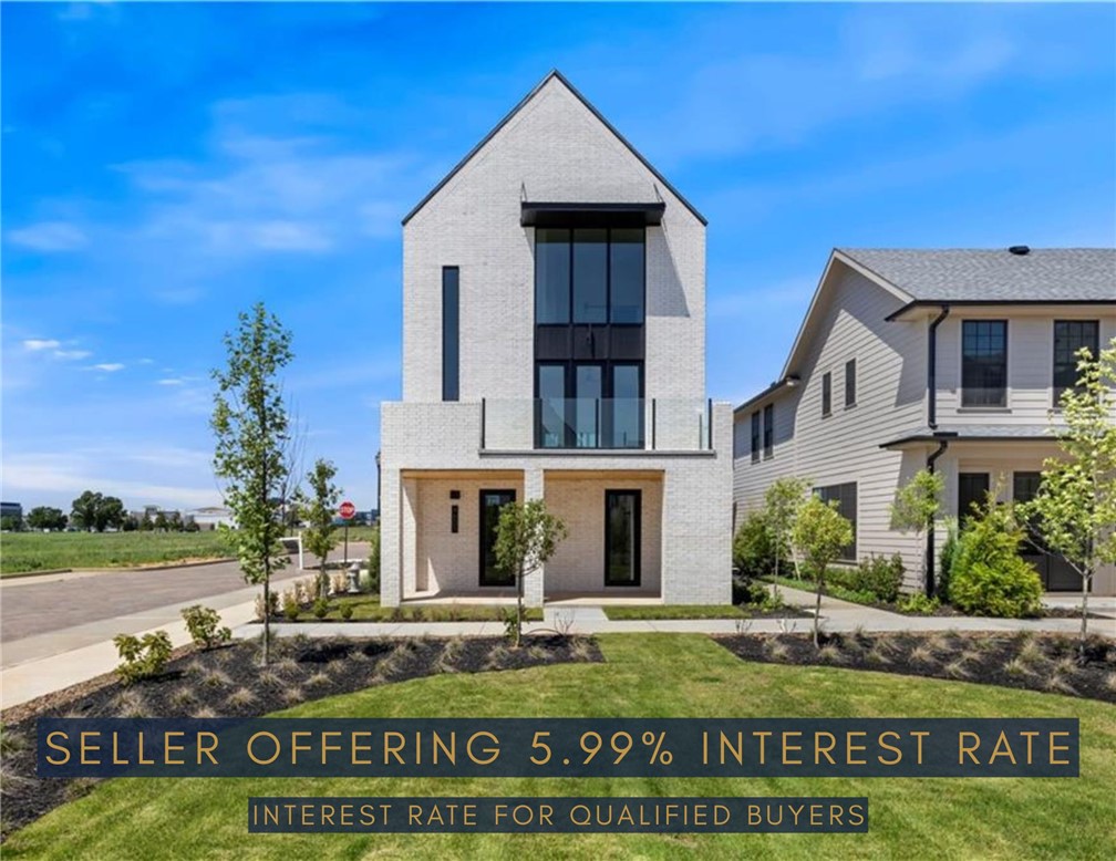 Seller offering credit to qualified buyers and may obtain a rate as low as 5.99% with preferred lender (APR will vary). Subject to lender approval, credit qualification, and program availability. This beautiful home sits in the heart of town, offering an unbeatable location and luxurious living. The new Pinnacle Village Development is just off Pinnacle Hills Parkway, behind the Walmart Neighborhood Market. Each unit showcases hardwood floors, 10' ceilings, 8' interior doors, designer lighting, and a programmable thermostat. The open kitchen features quartz countertops, premium stainless-steel appliances, and a gas range. An elevator provides access to every level. The lower-level bedroom is ideal for guests or a mother-in-law suite. Includes washer and dryer. Spacious 2-car garage with EV outlet. Walk to the Walmart AMP, Topgolf, restaurants, shopping, and entertainment. Ideal as a primary residence or investment.