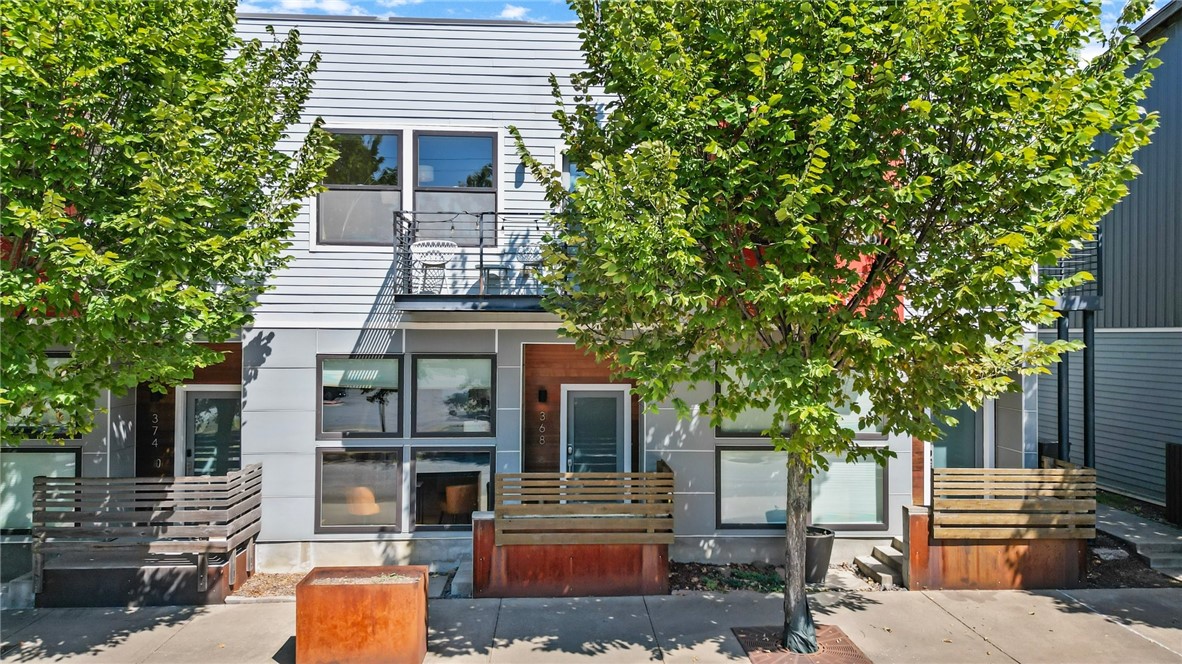 Check out this modern, fully furnished, income producing Airbnb in the heart of Fayetteville! This could be your next home or your next investment property! Located in the growing SoFay district of Fayetteville, just a few blocks away from the historic Fayetteville square, University of Arkansas, Dickson Street, Walton Arts Center, and the Razorback Greenway is just a few steps from your front door. There is an abundance of natural light and an open floor plan that is perfect for entertaining. Both bedrooms are located upstairs for privacy and the primary bedroom has a private balcony! Upgrades throughout this beautiful home includes quartz counter tops, bamboo flooring throughout main living areas, high ceilings, built ins, stainless steel appliances, and designer fixtures. Schedule your private tour today! All furniture and applicances to convey