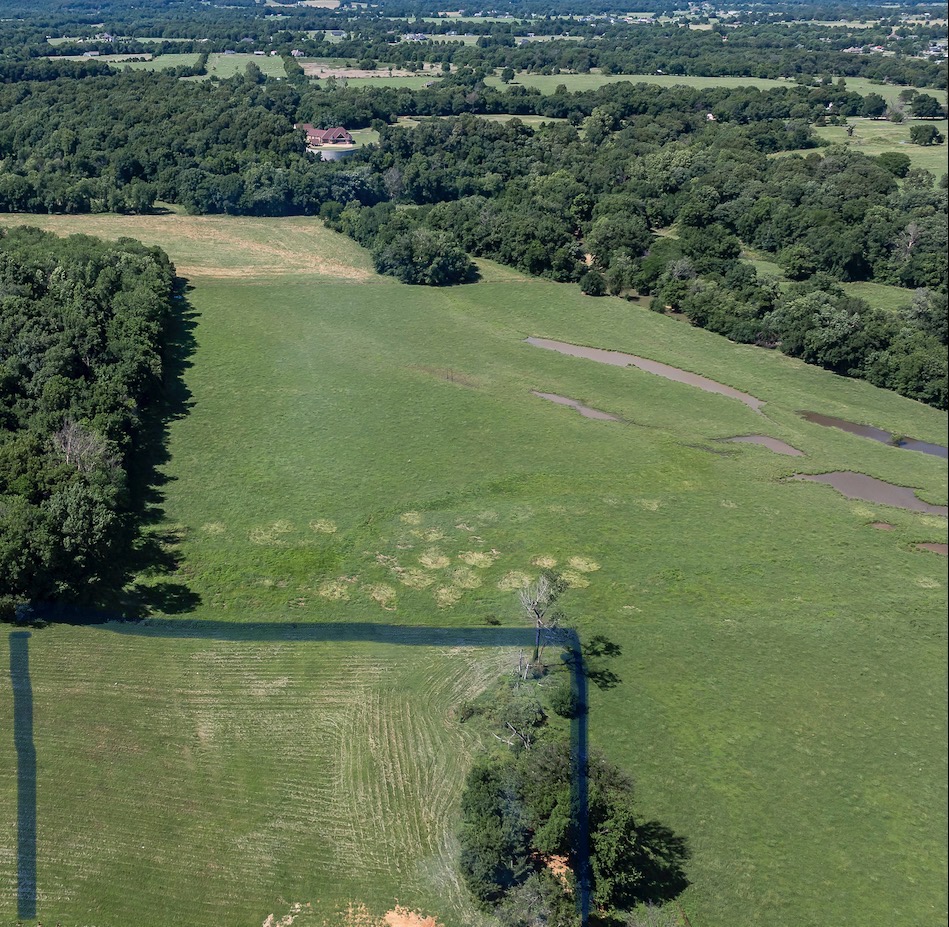 Exceptionally beautiful and truly one-of-a-kind scenery on this 3.01-acre property! Enjoy breathtaking views of the Illinois River, grazing cattle in the pasture, distant mountains, and exceptionally fresh, clean air. Just minutes from shopping, local schools, downtown Prairie Grove, Highway 62, and Battlefield State Park, and only 23 minutes from the university.
Underground electric and high-speed internet (OzarksGo Fiber) are already on site. The water tap fee has been paid. The property has been surveyed, and a soil test has been completed, making it ready for your dream home, a small hobby farm, a nursery, or whatever your heart desires. Opportunities like this are becoming harder to find in this growing area, making this an excellent place to build now or invest for the future.
