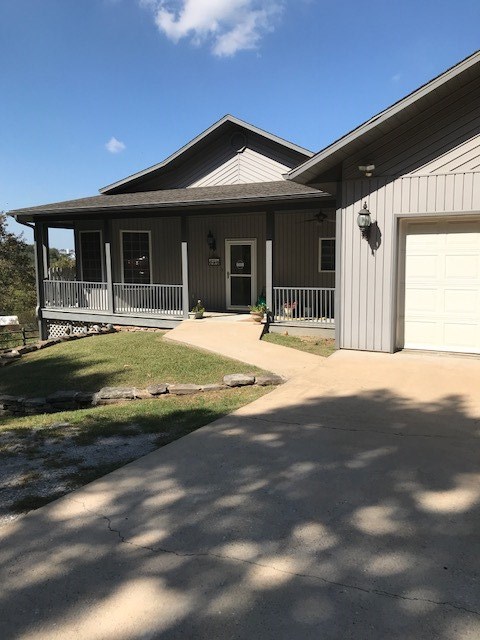 Beautiful country home on private 9.08 acres. Open floorplan, updated hardwood floors and new carpet in bedrooms. Stunning natural fireplace. Oversized garage, 8 x 12 storage building. Horses will love spring fed pond and barn. Just minutes to downtown Huntsville.