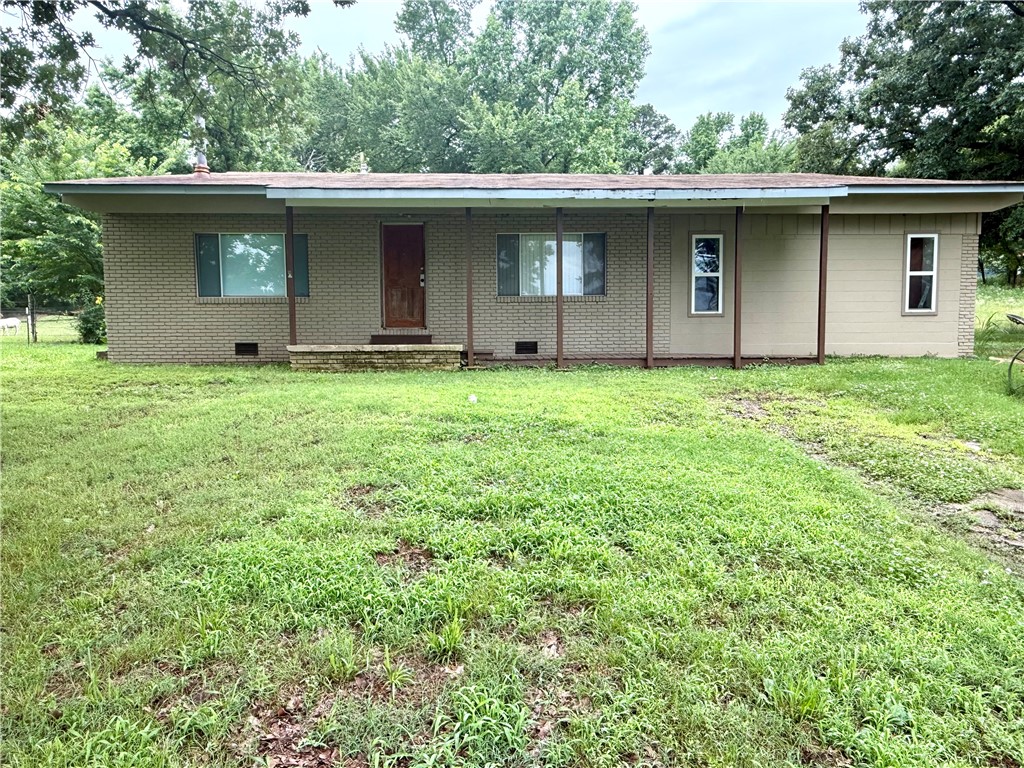 Three bedroom home on over an acre close to schools and the interstate. This great home has tons of potential and great space and privacy. If you’re looking for a great investment, you don’t want to miss this unique property.