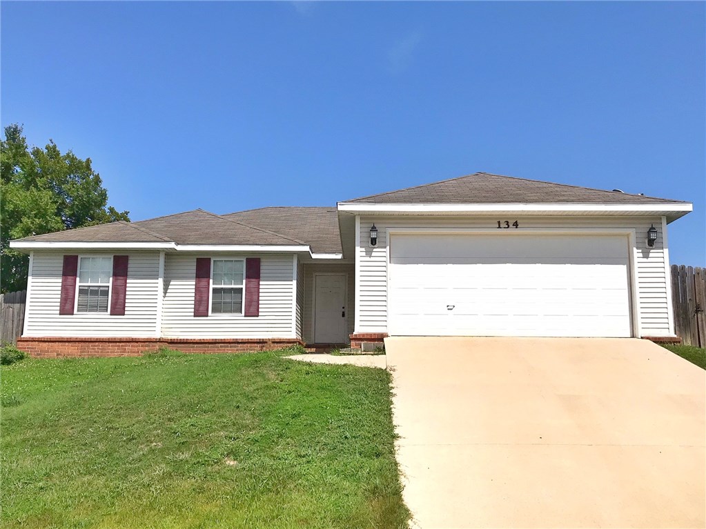 Great 3 bedroom 2 bath home with oversized living room and kitchen. Fenced yard.