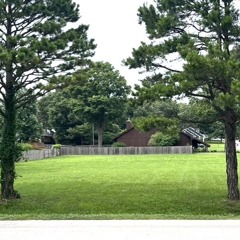 Exceptional commercial opportunity! Prime, highly visible corner lot in a thriving, high-traffic location just off Highway 71 (N. College Ave/Thompson street). At the intersection of Main Drive and Johnson Road, zoned C-2, this level, ready-to-develop property offers outstanding flexibility for a wide variety of commercial uses, with all utilities available. Surrounded by established businesses and just minutes away from the Northwest Arkansas Mall, Lake Fayetteville, Springdale Country Club, the Razorback Greenway Trail System, and numerous restaurants and retail destinations. This is an ideal location to bring your business or investment vision to life.