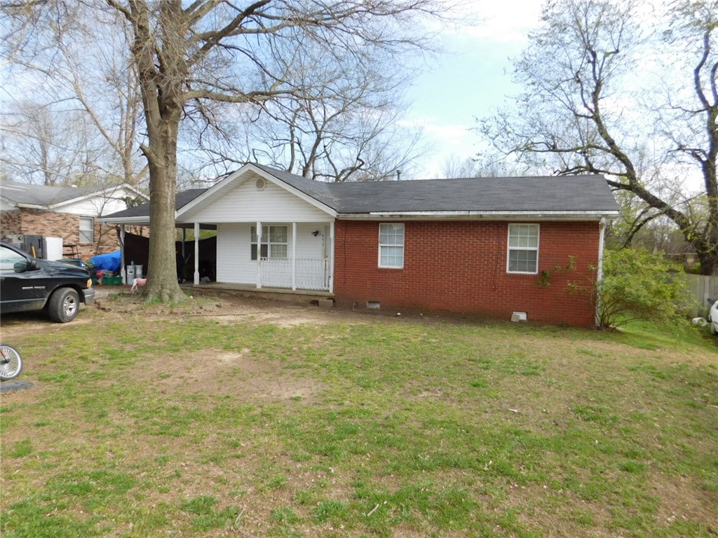 3 BR home in great neighborhood, convenient to everywhere (U of A, parks, I-49, downtown, Fayetteville, etc). Tremendous yard (80x230) with fenced area for pets & children. Good structure, needs some updating, would make a great investment property or family home. A portion of backyard is in flood zone, but Seller is working on flood certificate to eliminate any floor insurance requirement.