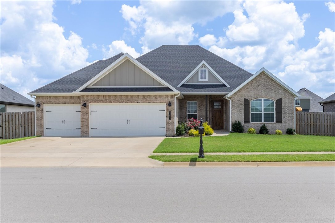 Welcome to this stunning, like-new brick home in the highly desirable Arlington Subdivision Phase 2! 
Step inside to discover an inviting open layout highlighted by elegant wood, tile, and plush carpet flooring. The gourmet kitchen boasts sleek granite countertops, an ice maker connection, and premium gas appliances. Relax by the cozy gas-log fireplace in the main living area, or retreat to the dedicated private office/study—perfect for working from home.
The split-bedroom floor plan includes a spacious primary suite with walk-in closets, while the property offers ample attic storage and a 3-car garage. Outside, enjoy a fully fenced backyard featuring a covered patio and porch ideal for outdoor entertaining. Plus, take advantage of the fantastic community pool! Wonderfully located near local schools and parks in Pea Ridge.