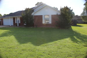 Open floor plan with living, dining and kitchen combination, 3 bedroom 2 bath home with deck and wood privacy fenced back yard. Convenient to Pottsville Elementary and golf course.