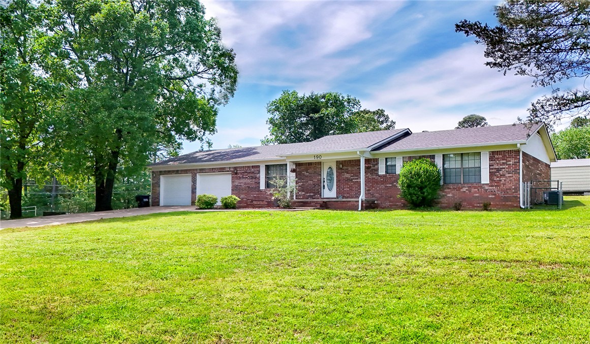 Spacious ranch style home on a desirable corner lot with over and acre of land. This property offers a comfortable layout featuring a welcoming living area, a large kitchen complete with refrigerator and new stove, and a dedicated dining space perfect for everyday meals or entertaining. Enjoy the convenience of a generously sized laundry room and a well-designed floor plan with 3 bedrooms and 2 full baths. The main bedroom includes a walk-in closet for added storage and comfort. Outside, you'll find a 12x24 storage building with built-in shelving. With plenty of outdoor space and a prime location this property combines country-style living with everyday convenience.