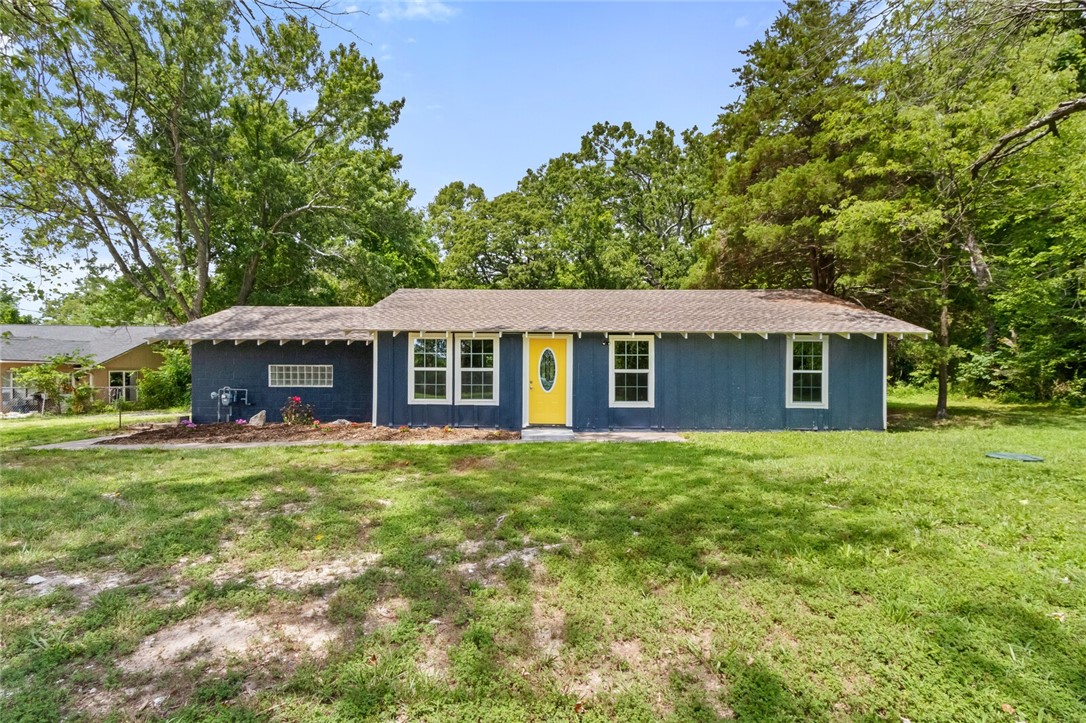 Beautifully remodeled, ranch-style home on partially wooded 1.35 acres - built back from the road providing extra privacy to enjoy the peace of country living with the convenience of <5 miles to Hwy 62, shopping & amenities. House has new roof, septic system, HVAC, & tankless water heater. Replaced plumbing & electrical, removed propane tank, & added natural gas connection. New insulation, sheetrock & interior paint throughout. New doors, windows, blinds & wood laminate flooring. Renovated Kitchen w/new cabinets, countertop, backsplash, sink, appliances, light fixture & tile flooring. Baths w/new toilets, tub/shower combos, vanities, mirrors & tile. Home includes new LED light fixtures & hallway smoke/carbon monoxide detector. New garage door w/opener & keyless entry. Exterior is newly painted. All bedrooms wired for ceiling fans & satellite coax connections. Supra attached to gas meter, front left, by the garage. **SELLER to pay UP TO $10K toward BUYER'S CLOSING COSTS w/FULL-PRICE ACCEPTED OFFER. See MLS Remarks**