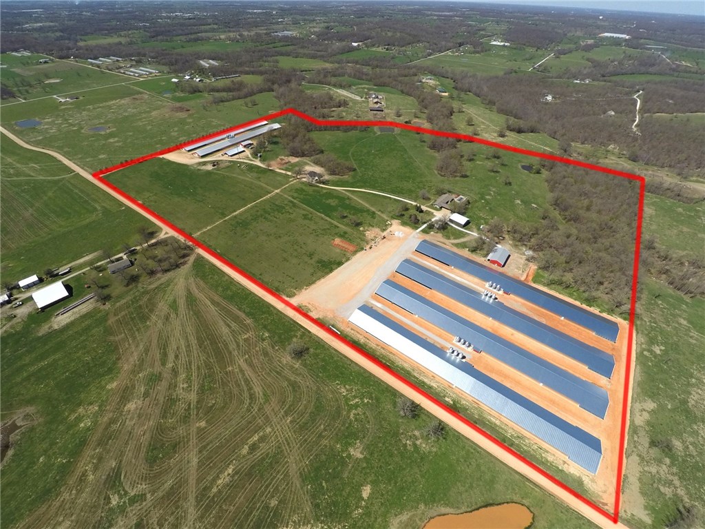 Brand New (6) 66 x 600 broiler farm on 80 acres with to many extras. Poultry houses are 1 & 2 years old. Large stacking sheds with shop/well/generator buildings. 2 Eco drum compost system. Large main 3058 square foot 5 bedroom 3 bath main house with in ground pool and large new insulated shop/garage.  2nd dwelling is new 3 bedroom 2 bath brick home.  Tons of extras and room for more houses. A show place.