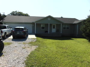 Very nice 4 bed, 2 bath home with a sunroom on 3 acres.  Only 4 years old, this one would make a great starter home. Carpet in Bedroom but very nice wood laminate throughout rest of house.  Open living room, dining and kitchen area.  Large master bed, bath and walk in closet.  A Must See!!