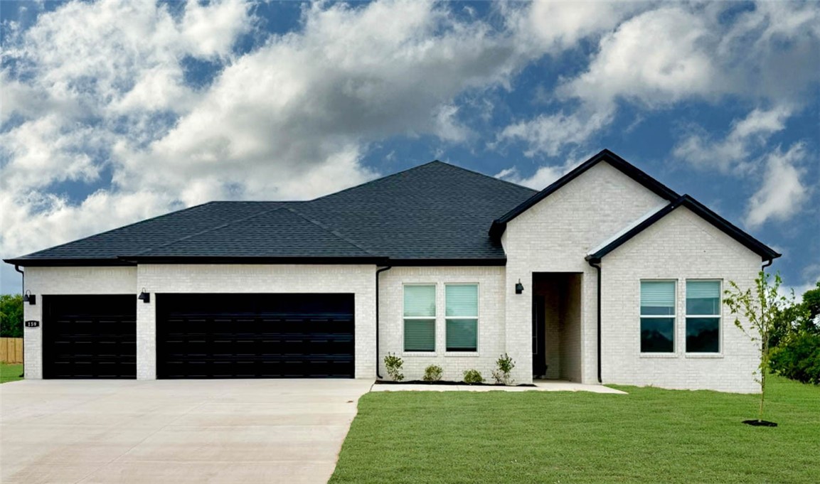 The Garland plan in Renley Rae in Springdale, AR! This plan offers 4 bedrooms and 3 bathrooms! Single-story homes feature engineered wood flooring throughout and tile flooring in the primary bathroom. The kitchen features quartz countertops, 42’’ cabinets, black hardware, and a gas range. The living room features a beautiful modern fireplace with a poplar mantle! Fans are included in all bedrooms and the living room! The primary ensuite will have a walk-in shower, separate tub, and quartz countertops! The exterior of these homes will have 4-sides brick with Hardie® siding (per plan) with a 3-car garage! Each home will have a lovely covered back patio. Taxes, HOA, and parcel TBD. Home is located within Tontitown city limits but has a Springdale address and zip code.