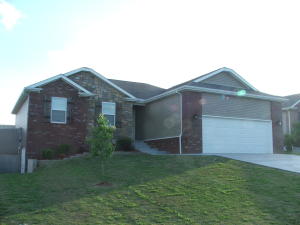 Beautiful one year old Brick & Frame home in newer subdivision. 4 BR 3BA home includes large living & family rooms. Lots of storage. Large great room with split floor plan. Privacy fenced yard, deck, landscaping.