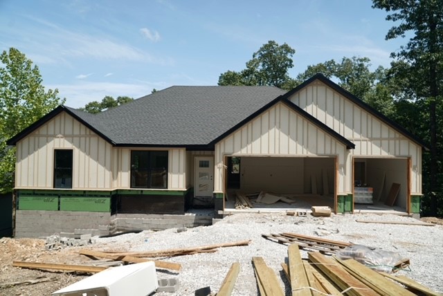 New Floor Plan. 3 bedrooms, 2 baths and spacious 3 car garage. In early stages of construction. Save this listing and check back for new photos every few weeks or drive by. Buyers now can make some design choices within a selection from our local vendors.