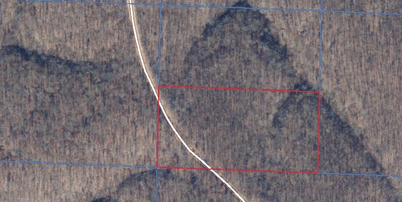 Here is your chance to own  land right off the highway while enjoying the wild life and tranquility of the county.  Gravette Schools, Bella Vista address.