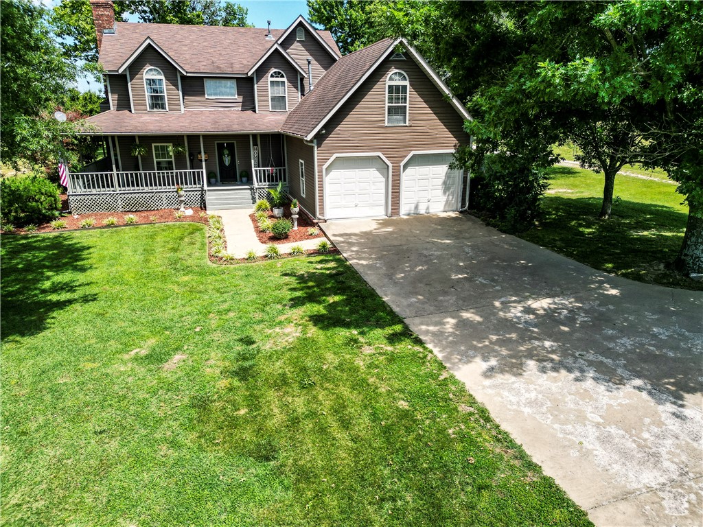 Welcome to 18500 Harmon Rd in Fayetteville, where farmhouse charm meets incredible functionality on over 2 acres. From the moment you arrive, the gated entrance, wraparound porch, and phenomenal curb appeal set the tone for this beautiful property. Inside, you’ll find a warm and inviting 3 bedroom, 2.5 bath home with a spacious bonus room offering flexibility for a home office, media room, playroom, or guest space.
Designed for both everyday living and entertaining, this property features a gorgeous pool, plenty of outdoor space, and a peaceful setting that feels private while still being convenient to town. The classic farmhouse feel carries throughout, creating a welcoming atmosphere inside and out. A 1,250 square foot shop provides excellent space for storage, hobbies, equipment, or workspace needs.
With its wraparound porch, gated entry, pool, acreage, bonus room, and impressive shop, this Fayetteville property offers the perfect blend of comfort, character, and versatility.
